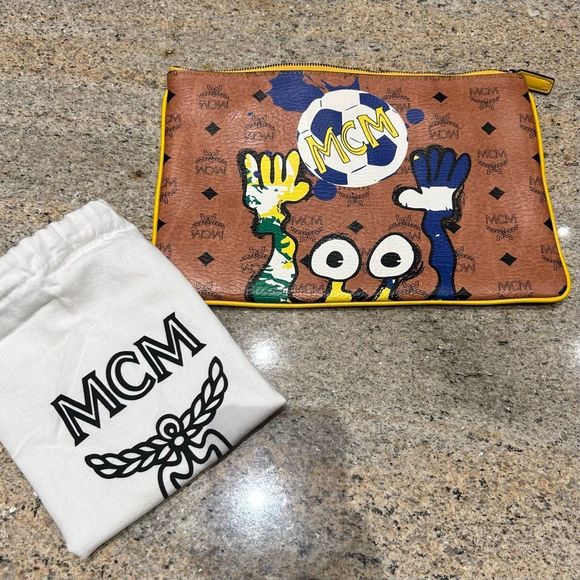 MCM Handbags - MCM Clutch Soccer Ball with dustbag